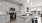 a kitchen with white cabinets