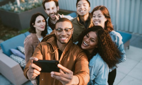 a group of people posing for a photo